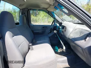 2003 Ford F-150 XL with VIN 1FTRF18243NB29920, listed as a IAAI auction lot 42037138 with 230,215 mi miles and . Bid and sale history available at DreamBid. Image 5.