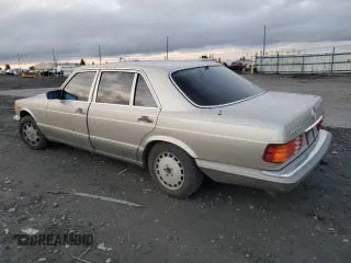 1986 Mercedes-Benz 560 with VIN WDBCA39DXGA239219, listed as a Copart auction lot 82033964 with 181,031 mi miles and Clean Title. Bid and sale history available at DreamBid. Image 2.