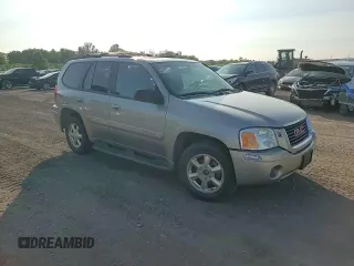 2002 GMC Envoy SLT with VIN 1GKDT13S322420861, listed as a Copart auction lot 63408164 with 250,167 mi miles and Salvage Title. Bid and sale history available at DreamBid. Image 11.