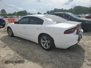 2015 Dodge Charger SXT with VIN 2C3CDXHGXFH865725, listed as a Copart auction lot 54217975 with 147,494 mi miles and Salvage Title. Bid and sale history available at DreamBid. Image 2.