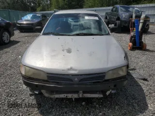 1998 Mitsubishi Mirage DE z VIN JA3AY26A6WU029219, wystawiony jako Copart lot #72253654 z przebiegiem Nie podano mil oraz Szkoda całkowita • Salvage title. Historia ofert i sprzedaży dostępna na DreamBid. Obrazek 5.