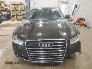 2015 Audi A8 4.0T z VIN WAUJ2AFD5FN009882, wystawiony jako Copart lot #84222704 z przebiegiem 56 118 mil mil oraz Czysty tytuł • Clean title. Historia ofert i sprzedaży dostępna na DreamBid. Obrazek 5.