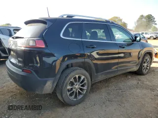 2020 Jeep Cherokee Latitude Plus with VIN 1C4PJLLB2LD623868, listed as a Copart auction lot 50224685 with 128,507 mi miles and Salvage title. Bid and sale history available at DreamBid. Image 3.