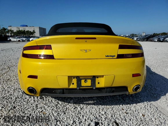2009 Aston Martin Vantage z VIN SCFBF04C79GD12188, wystawiony jako Copart lot #45348405 z przebiegiem 29 580 mil mil oraz Szkoda całkowita • Salvage title. Historia ofert i sprzedaży dostępna na DreamBid. Obrazek 6.