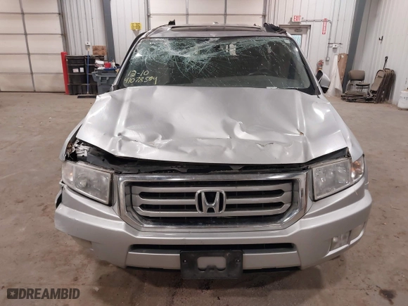 2014 Honda Ridgeline RTL with VIN 5FPYK1F57EB012362, listed as a IAAI auction lot 41078509 with 149,590 mi miles. Bid and sale history available at carsss.com. Image 6.