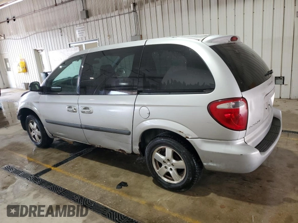 2005 Dodge Caravan SXT with VIN 1D4GP45RX5B165500, listed as a Copart auction lot 59680105 with 119,096 mi miles and Salvage title. Bid and sale history available at DreamBid. Image 2.