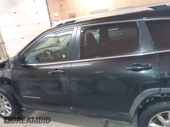 2014 Jeep Cherokee Limited z VIN 1C4PJMDS0EW240958, wystawiony jako IAAI lot #41541340 z przebiegiem 140 625 mil mil oraz . Historia ofert i sprzedaży dostępna na DreamBid. Obrazek 14.