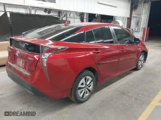 2016 Toyota Prius Four with VIN JTDKARFU0G3509454, listed as a IAAI auction lot 41809217 with 154,871 mi miles. Bid and sale history available at carsss.com. Image 4.