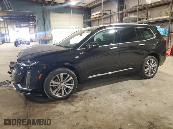 2020 Cadillac XT6 FWD Premium Luxury with VIN 1GYKPCRSXLZ154638, listed as a Copart auction lot 57439835 with 142,435 mi miles and Salvage title. Bid and sale history available at DreamBid. Image 1.