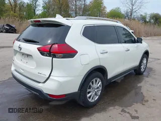 2017 Nissan Rogue S with VIN 5N1AT2MM3HC794051, listed as a IAAI auction lot 42063921 with 129,586 mi miles and . Bid and sale history available at DreamBid. Image 4.