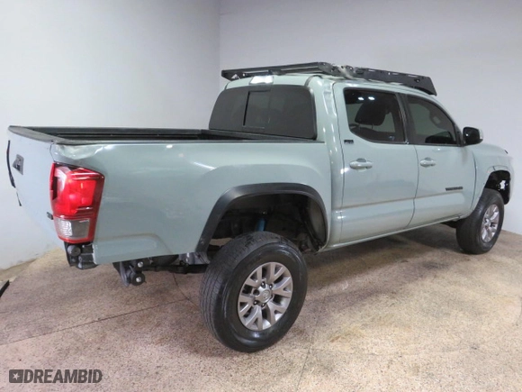 2022 Toyota Tacoma 4WD SR with VIN 3TMCZ5AN0NM505650, listed as a Copart auction lot 74743904 with 35,497 mi miles and Salvage Title. Bid and sale history available at carsss.com. Image 3.