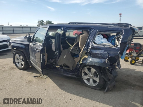 2014 Jeep Patriot Latitude with VIN 1C4NJPFA9ED509614, listed as a Copart auction lot 52938095 with 29,212 mi miles and Salvage title. Bid and sale history available at DreamBid. Image 2.