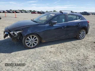 2017 Mazda 3 Grand Touring z VIN 3MZBN1M3XHM148604, wystawiony jako Copart lot #52258885 z przebiegiem Nie podano mil oraz Szkoda całkowita • Salvage title. Historia ofert i sprzedaży dostępna na DreamBid. Obrazek 1.