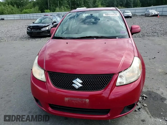 2012 Suzuki SX4 LE with VIN JS2YC5A34C6300079, listed as a Copart auction lot 68414434 with 111,661 mi miles and Salvage Title. Bid and sale history available at carsss.com. Image 10.