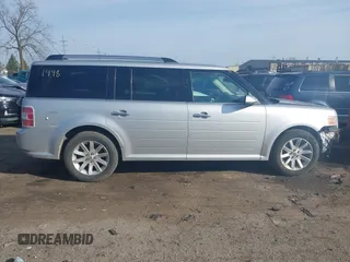 2011 Ford Flex SEL z VIN 2FMGK5CC2BBD21448, wystawiony jako IAAI lot #41814326 z przebiegiem 153 700 mil mil oraz . Historia ofert i sprzedaży dostępna na DreamBid. Obrazek 13.