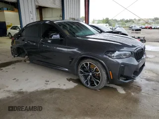 2022 BMW X4 M z VIN 5YM23EC01N9N39875, wystawiony jako Copart lot #66325504 z przebiegiem 35 324 mil mil oraz Szkoda całkowita • Salvage title. Historia ofert i sprzedaży dostępna na DreamBid. Obrazek 4.