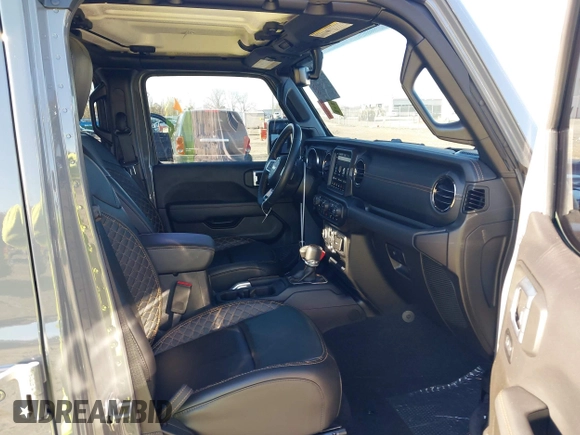 2022 Jeep Gladiator High Altitude with VIN 1C6HJTFGXNL124571, listed as a IAAI auction lot 41272140 with 14,198 mi miles and . Bid and sale history available at DreamBid. Image 5.
