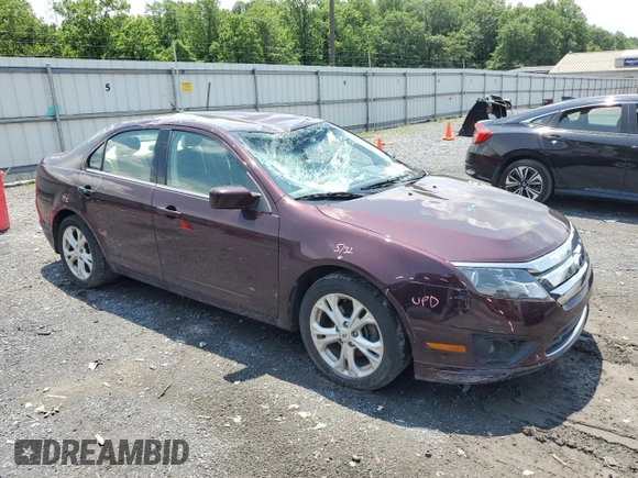 2012 Ford Fusion SE z VIN 3FAHP0HAXCR253297, wystawiony jako Copart lot #60302645 z przebiegiem 138 619 mil mil oraz Szkoda całkowita • Salvage title. Historia ofert i sprzedaży dostępna na DreamBid. Obrazek 4.