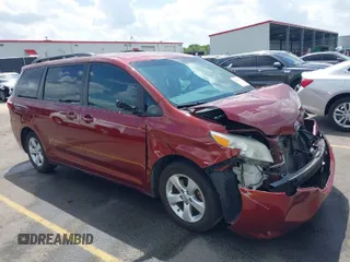 2015 Toyota Sienna LE AAS with VIN 5TDKK3DC7FS685452, listed as a IAAI auction lot 41942789 with 194,163 mi miles. Bid and sale history available at carsss.com. Image 1.