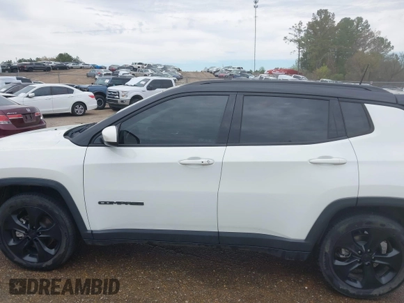 2020 Jeep Compass Latitude with VIN 3C4NJCBB9LT118042, listed as a IAAI auction lot 41811634 with 62,717 mi miles and . Bid and sale history available at carsss.com. Image 14.