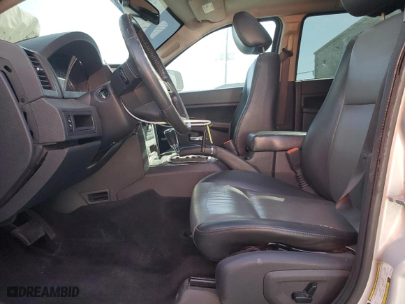 2009 Jeep Grand Cherokee Laredo with VIN 1J8GS48KX9C514254, listed as a Copart auction lot 49809175 with 293,040 mi miles and Salvage Title. Bid and sale history available at carsss.com. Image 7.