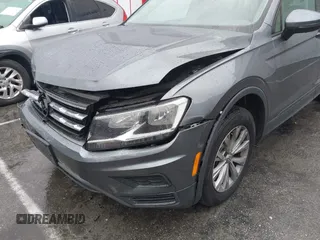 2020 Volkswagen Tiguan S z VIN 3VV1B7AX7LM129259, wystawiony jako IAAI lot #41806178 z przebiegiem 48 953 mil mil oraz . Historia ofert i sprzedaży dostępna na DreamBid. Obrazek 6.