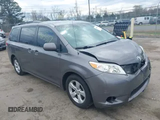 2014 Toyota Sienna LE AAS with VIN 5TDKK3DC2ES519967, listed as a IAAI auction lot 41863397 with 124,130 mi miles and . Bid and sale history available at DreamBid. Image 1.