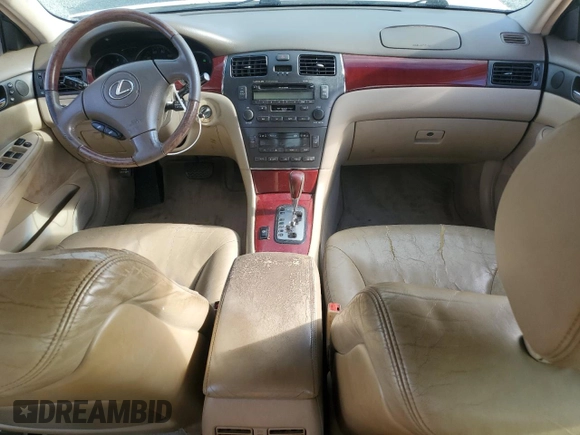 2002 Lexus ES 300 with VIN JTHBF30GX25018502, listed as a Copart auction lot 79828334 with 296,986 mi miles and Salvage Title. Bid and sale history available at DreamBid. Image 8.