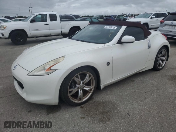 2012 Nissan 370Z Touring with VIN JN1AZ4FH1CM371246, listed as a Copart auction lot 74752074 with 60,688 mi miles and Salvage Title. Bid and sale history available at carsss.com. Image 1.