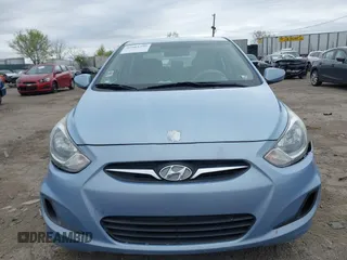 2014 Hyundai Accent GLS with VIN KMHCT4AE3EU702573, listed as a IAAI auction lot 42083350 with 123,392 mi miles. Bid and sale history available at carsss.com. Image 6.