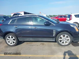 2014 Cadillac SRX Performance Collection with VIN 3GYFNCE39ES613051, listed as a IAAI auction lot 42113063 with 82,952 mi miles and . Bid and sale history available at carsss.com. Image 13.
