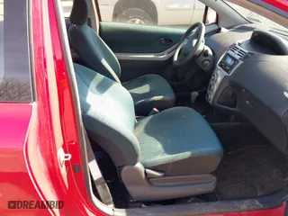 2007 Toyota Yaris with VIN JTDJT923775034473, listed as a IAAI auction lot 41598782 with 203,121 mi miles. Bid and sale history available at carsss.com. Image 5.