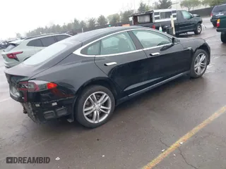 2013 Tesla Model S with VIN 5YJSA1CN0DFP20408, listed as a IAAI auction lot 41524470 with 1 mi miles. Bid and sale history available at carsss.com. Image 4.