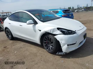 2021 Tesla Model Y Performance z VIN 5YJYGDEF7MF277769, wystawiony jako IAAI lot #42025157 z przebiegiem 28 522 mil mil oraz . Historia ofert i sprzedaży dostępna na DreamBid. Obrazek 1.