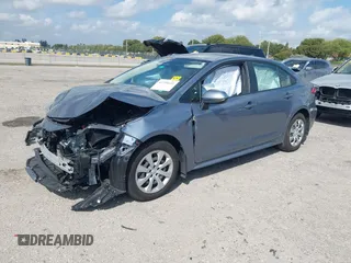 2023 Toyota Corolla Hybrid LE with VIN JTDBCMFE8PJ010693, listed as a IAAI auction lot 41736641 with 10,751 mi miles. Bid and sale history available at carsss.com. Image 2.