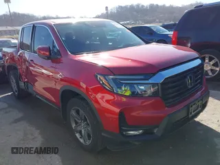 2023 Honda Ridgeline RTL z VIN 5FPYK3F54PB010082, wystawiony jako IAAI lot #41759939 z przebiegiem 15 898 mil mil oraz . Historia ofert i sprzedaży dostępna na DreamBid. Obrazek 1.