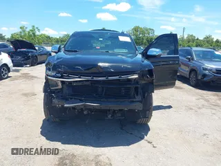 2021 Chevrolet Tahoe Premier with VIN 1GNSKSKDXMR195984, listed as a IAAI auction lot 42528305 with 89,925 mi miles and . Bid and sale history available at DreamBid. Image 6.