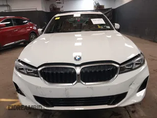 2023 BMW 3 Series 330e xDrive with VIN 3MW39FS05P8D20575, listed as a IAAI auction lot 42076033 with 10,875 mi miles. Bid and sale history available at carsss.com. Image 12.