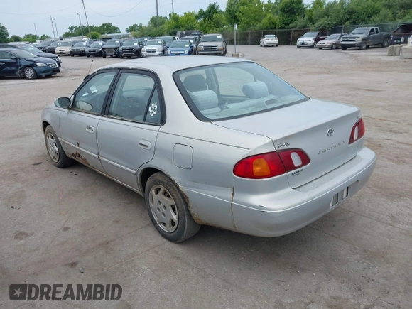 1999 Toyota Corolla VE z VIN 2T1BR12E7XC154444, wystawiony jako IAAI lot #42514069 z przebiegiem 209 377 mil mil oraz . Historia ofert i sprzedaży dostępna na DreamBid. Obrazek 3.