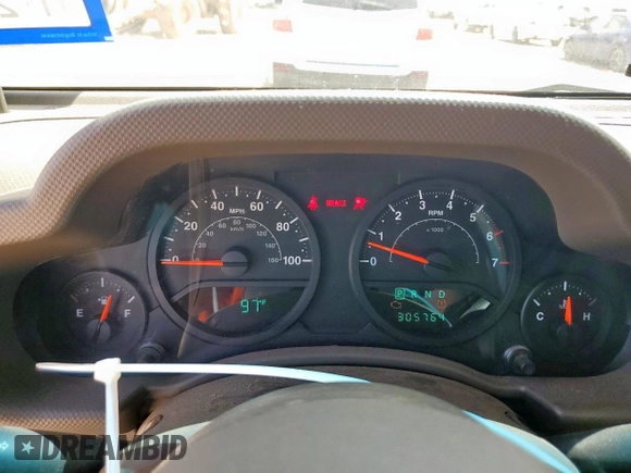 2008 Jeep Wrangler Unlimited X с VIN 1J4GA39128L537191, выставлен на аукционе Copart как лот 56844345 с пробегом 305 764 миль миль и Списание • Salvage title. История ставок и продаж доступна на DreamBid. Изображение 9.