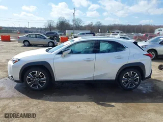 2021 Lexus UX with VIN JTHP9JBH0M2039502, listed as a IAAI auction lot 41868672 with 17,496 mi miles. Bid and sale history available at carsss.com. Image 14.
