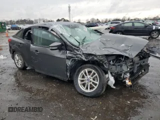 2016 Ford Focus SE with VIN 1FADP3F26GL354210, listed as a Copart auction lot 50378885 with 9,617 mi miles and Salvage Title. Bid and sale history available at DreamBid. Image 4.