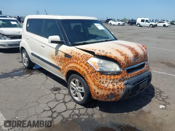 2010 Kia Soul + with VIN KNDJT2A28A7078333, listed as a IAAI auction lot 42097259 with 165,243 mi miles. Bid and sale history available at carsss.com. Image 1.