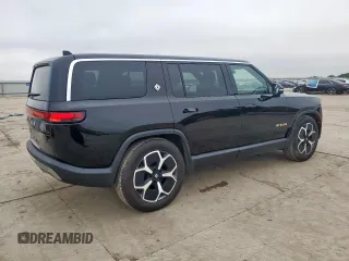 2024 Rivian R1S Adventure z VIN 7PDSGABAXRN035556, wystawiony jako Copart lot #59114065 z przebiegiem 9119 mil mil oraz Szkody całkowita. Historia ofert i sprzedaży dostępna na DreamBid. Obrazek 3.