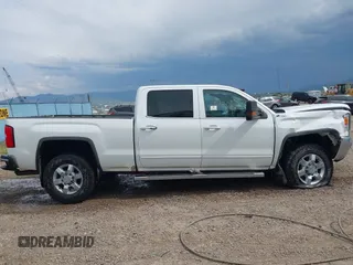 2018 GMC Sierra 2500HD SLE с VIN 1GT12SEG5JF253443, выставлен на аукционе IAAI как лот 41742414 с пробегом Не указан миль и . История ставок и продаж доступна на DreamBid. Изображение 13.
