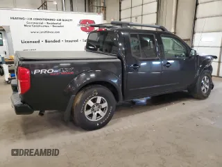 2011 Nissan Frontier Pro-4X with VIN 1N6AD0EVXBC449326, listed as a Copart auction lot 54994455 with 93,841 mi miles and Salvage title. Bid and sale history available at DreamBid. Image 3.