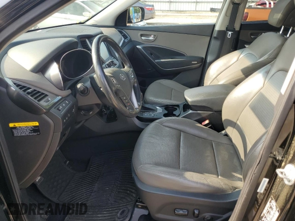 2014 Hyundai Santa Fe with VIN 5XYZUDLBXEG198796, listed as a Copart auction lot 56596375 with 106,017 mi miles and Salvage title. Bid and sale history available at DreamBid. Image 7.