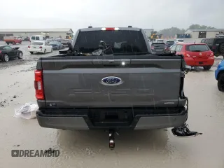 2023 Ford F-150 XL with VIN 1FTFW1E86PFA65505, listed as a Copart auction lot 60644385 with 6,959 mi miles and Salvage title. Bid and sale history available at DreamBid. Image 6.