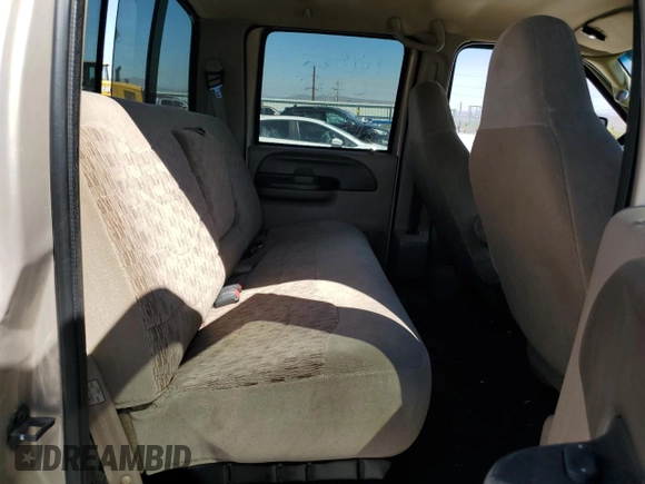 1999 Ford F-350 XL with VIN 1FTSW31S0XEC29624, listed as a Copart auction lot 70879344 with 151,680 mi miles and Salvage title. Bid and sale history available at DreamBid. Image 11.