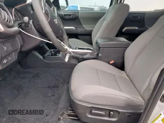 2023 Toyota Tacoma SR5 с VIN 3TMAZ5CNXPM213141, выставлен на аукционе Copart как лот 56695745 с пробегом 6 021 миль миль и Списание • Salvage title. История ставок и продаж доступна на DreamBid. Изображение 7.